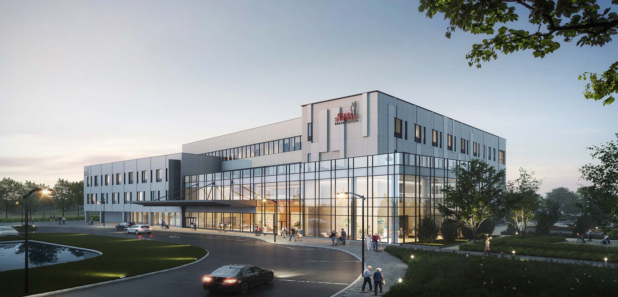A rendering of the Good Shephard Rehab building showcasing the modern style glass wall lobby, drive up to the entrance and surrounding grass patches.